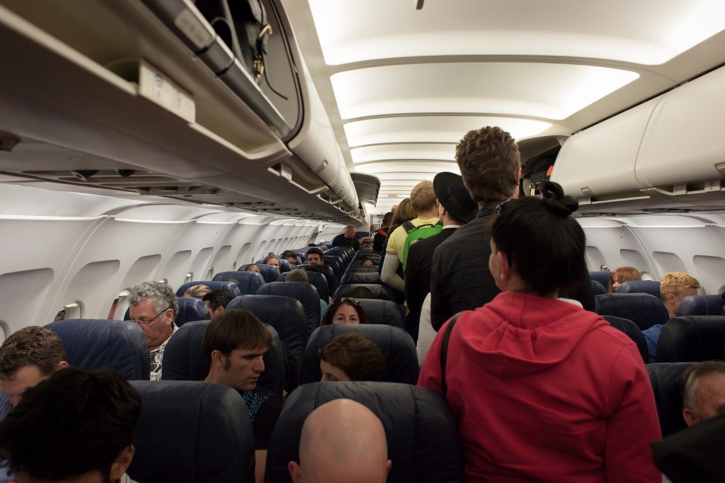 the worst types of people when flying overhead locker queue